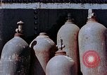Standbild Storage tank Hiroshima Japan, 1946, aus Sekunde 12 historischem Filmmaterial Videoclip 65675042131