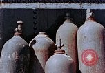 Standbild Storage tank Hiroshima Japan, 1946, aus Sekunde 13 historischem Filmmaterial Videoclip 65675042131