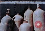 Standbild Storage tank Hiroshima Japan, 1946, aus Sekunde 18 historischem Filmmaterial Videoclip 65675042131