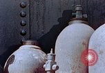 Standbild Storage tank Hiroshima Japan, 1946, aus Sekunde 27 historischem Filmmaterial Videoclip 65675042131
