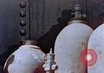 Standbild Storage tank Hiroshima Japan, 1946, aus Sekunde 30 historischem Filmmaterial Videoclip 65675042131