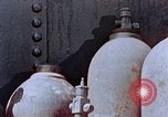 Standbild Storage tank Hiroshima Japan, 1946, aus Sekunde 31 historischem Filmmaterial Videoclip 65675042131