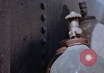 Standbild Storage tank Hiroshima Japan, 1946, aus Sekunde 32 historischem Filmmaterial Videoclip 65675042131