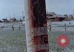 Standbild Telefonmast Hiroshima Japan, 1946, aus Sekunde 10 historischem Filmmaterial Videoclip 65675042132