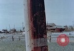 Standbild Telefonmast Hiroshima Japan, 1946, aus Sekunde 12 historischem Filmmaterial Videoclip 65675042132