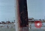 Standbild Telefonmast Hiroshima Japan, 1946, aus Sekunde 13 historischem Filmmaterial Videoclip 65675042132