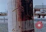 Standbild Telefonmast Hiroshima Japan, 1946, aus Sekunde 22 historischem Filmmaterial Videoclip 65675042132