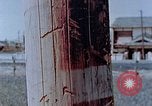 Standbild Telefonmast Hiroshima Japan, 1946, aus Sekunde 23 historischem Filmmaterial Videoclip 65675042132