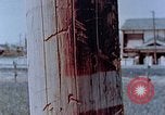 Standbild Telefonmast Hiroshima Japan, 1946, aus Sekunde 24 historischem Filmmaterial Videoclip 65675042132