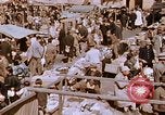 Image of market place Hiroshima Japan, 1946, second 15 stock footage video 65675042139