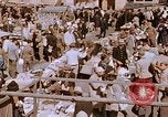 Image of market place Hiroshima Japan, 1946, second 18 stock footage video 65675042139