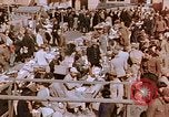 Image of market place Hiroshima Japan, 1946, second 21 stock footage video 65675042139