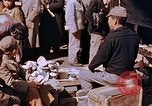 Image of market place Hiroshima Japan, 1946, second 49 stock footage video 65675042139