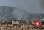 Standbild brennen Kaserne Hiroshima Japan, 1946, aus Sekunde 6 historischem Filmmaterial Videoclip 65675042140