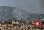 Standbild brennen Kaserne Hiroshima Japan, 1946, aus Sekunde 7 historischem Filmmaterial Videoclip 65675042140