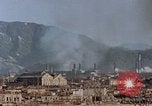 Standbild brennen Kaserne Hiroshima Japan, 1946, aus Sekunde 11 historischem Filmmaterial Videoclip 65675042140