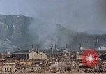 Standbild brennen Kaserne Hiroshima Japan, 1946, aus Sekunde 12 historischem Filmmaterial Videoclip 65675042140