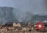 Standbild brennen Kaserne Hiroshima Japan, 1946, aus Sekunde 15 historischem Filmmaterial Videoclip 65675042140