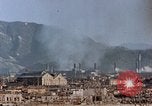 Standbild brennen Kaserne Hiroshima Japan, 1946, aus Sekunde 16 historischem Filmmaterial Videoclip 65675042140