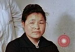 Image of Japanese nurse with atomic bomb scars Hiroshima Japan, 1945, second 20 stock footage video 65675042171