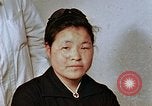 Image of Japanese nurse with atomic bomb scars Hiroshima Japan, 1945, second 22 stock footage video 65675042171