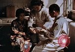 Standbild Opfer einer atomaren Explosion Hiroshima Japan, 1946, aus Sekunde 17 historischem Filmmaterial Videoclip 65675042174