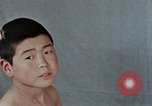 Standbild Haarausfall Nagasaki Japan, 1946, aus Sekunde 31 historischem Filmmaterial Videoclip 65675042176