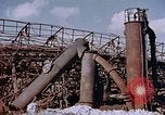 Image of collapsed metal stack Nagasaki Japan, 1946, second 18 stock footage video 65675042187