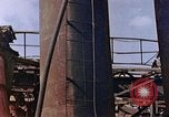 Image of collapsed metal stack Nagasaki Japan, 1946, second 32 stock footage video 65675042187