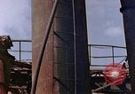 Image of collapsed metal stack Nagasaki Japan, 1946, second 33 stock footage video 65675042187