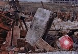Image of collapsed metal stack Nagasaki Japan, 1946, second 50 stock footage video 65675042187