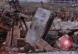 Image of collapsed metal stack Nagasaki Japan, 1946, second 51 stock footage video 65675042187