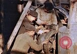 Standbild Carpenter Nagasaki Japan, 1946, aus Sekunde 13 historischem Filmmaterial Videoclip 65675042189