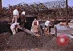 Standbild japanische Arbeiter Nagasaki Japan, 1946, aus Sekunde 39 historischem Filmmaterial Videoclip 65675042192