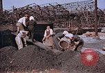Standbild japanische Arbeiter Nagasaki Japan, 1946, aus Sekunde 42 historischem Filmmaterial Videoclip 65675042192
