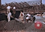 Standbild japanische Arbeiter Nagasaki Japan, 1946, aus Sekunde 43 historischem Filmmaterial Videoclip 65675042192