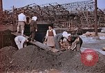 Standbild japanische Arbeiter Nagasaki Japan, 1946, aus Sekunde 44 historischem Filmmaterial Videoclip 65675042192
