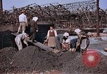 Standbild japanische Arbeiter Nagasaki Japan, 1946, aus Sekunde 46 historischem Filmmaterial Videoclip 65675042192