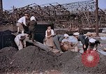 Standbild japanische Arbeiter Nagasaki Japan, 1946, aus Sekunde 50 historischem Filmmaterial Videoclip 65675042192