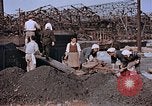 Standbild japanische Arbeiter Nagasaki Japan, 1946, aus Sekunde 51 historischem Filmmaterial Videoclip 65675042192