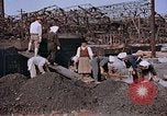 Standbild japanische Arbeiter Nagasaki Japan, 1946, aus Sekunde 52 historischem Filmmaterial Videoclip 65675042192