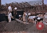 Standbild japanische Arbeiter Nagasaki Japan, 1946, aus Sekunde 54 historischem Filmmaterial Videoclip 65675042192