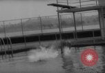 Image of divers at Aquarama New York United States USA, 1960, second 26 stock footage video 65675042261