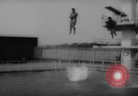 Image of divers at Aquarama New York United States USA, 1960, second 32 stock footage video 65675042261