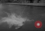 Image of divers at Aquarama New York United States USA, 1960, second 40 stock footage video 65675042261
