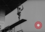 Image of divers at Aquarama New York United States USA, 1960, second 54 stock footage video 65675042261