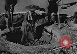 Image of house on fire China, 1945, second 20 stock footage video 65675042297