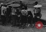 Image of house on fire China, 1945, second 27 stock footage video 65675042297