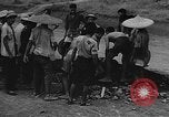 Image of house on fire China, 1945, second 28 stock footage video 65675042297