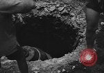 Image of house on fire China, 1945, second 34 stock footage video 65675042297